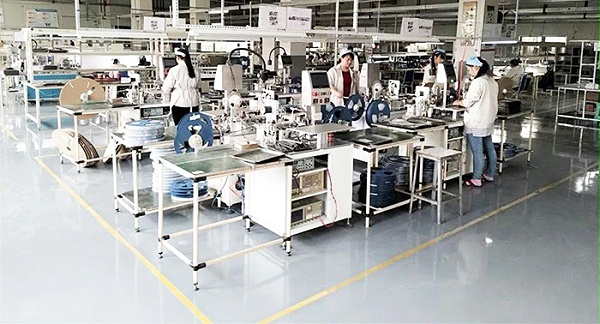 Integrated forming inductance automatic packet measuring workshop